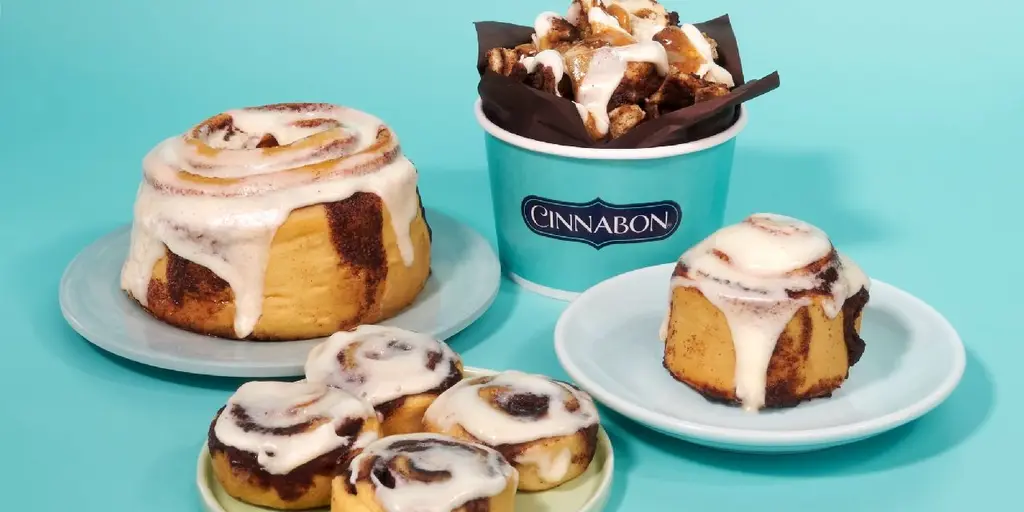 Warm Cinnabon Classic Roll with fresh frosting